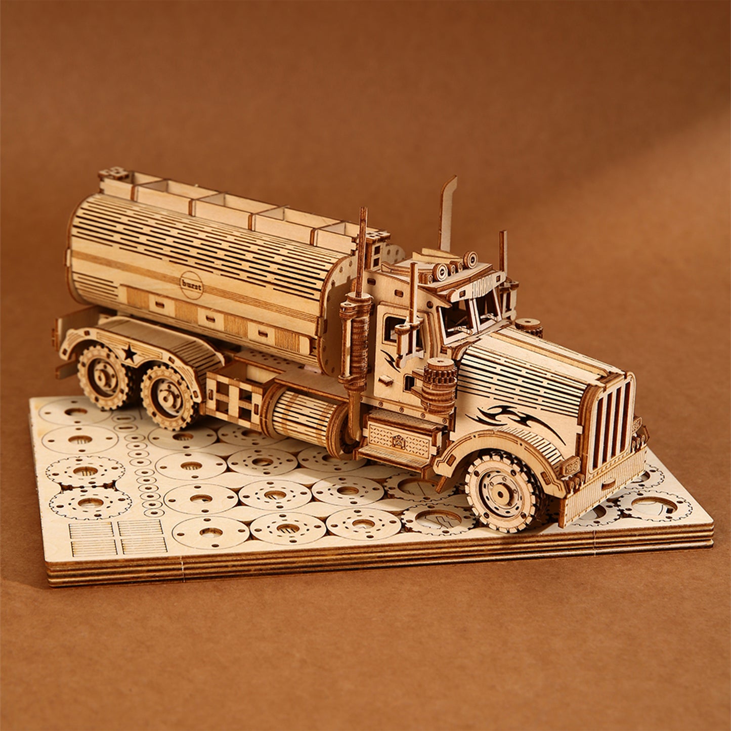 Wooden model of a truck on a matching base with a brown background