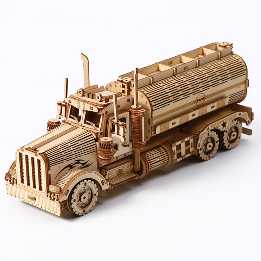 Wooden model of a truck on a white background