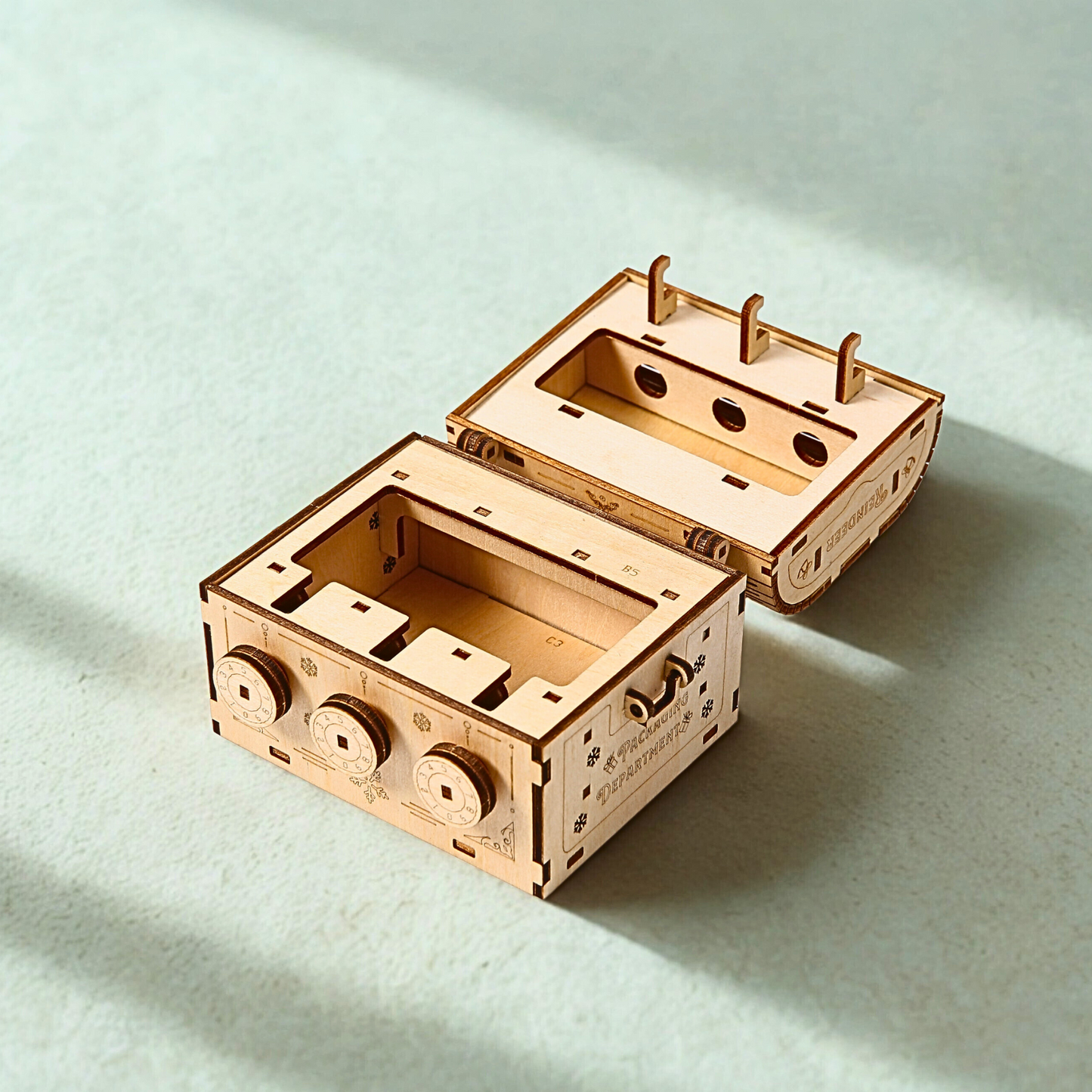 Wooden coding box puzzle model on a light surface