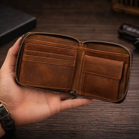 Leather Bifold Wallet in dark mocha full-grain leather, open to display a transparent ID window and card slots.