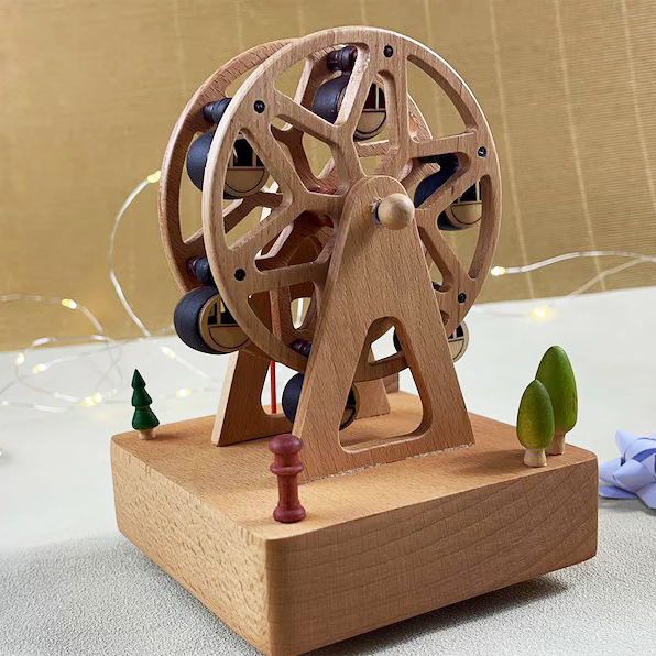 A wooden ferris wheel music box toy with intricate details, designed as a charming decorative and collectible piece.