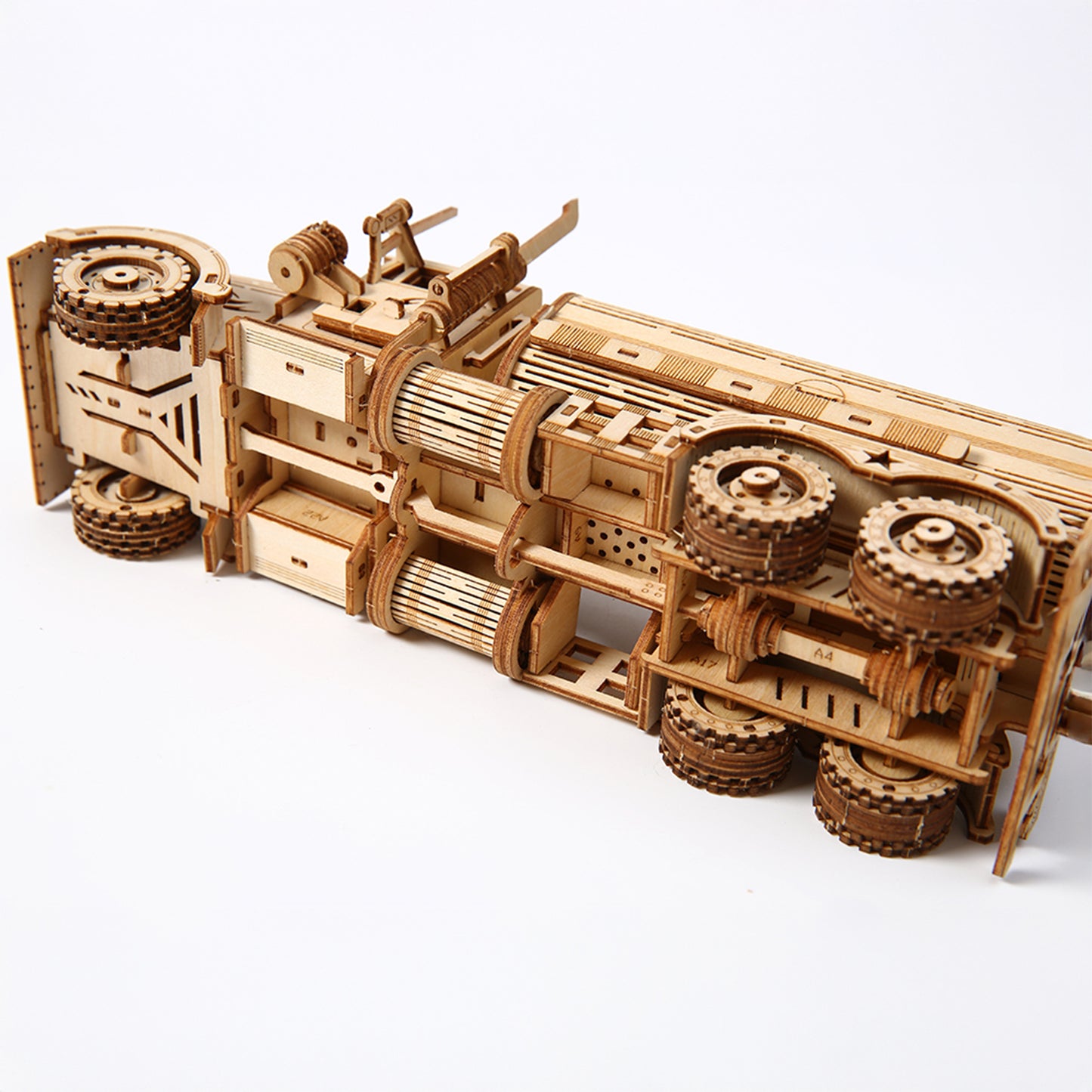 Wooden mechanical model on a white background