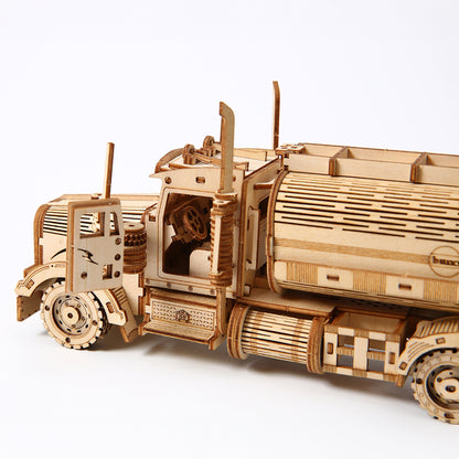 Wooden model of a truck on a white background