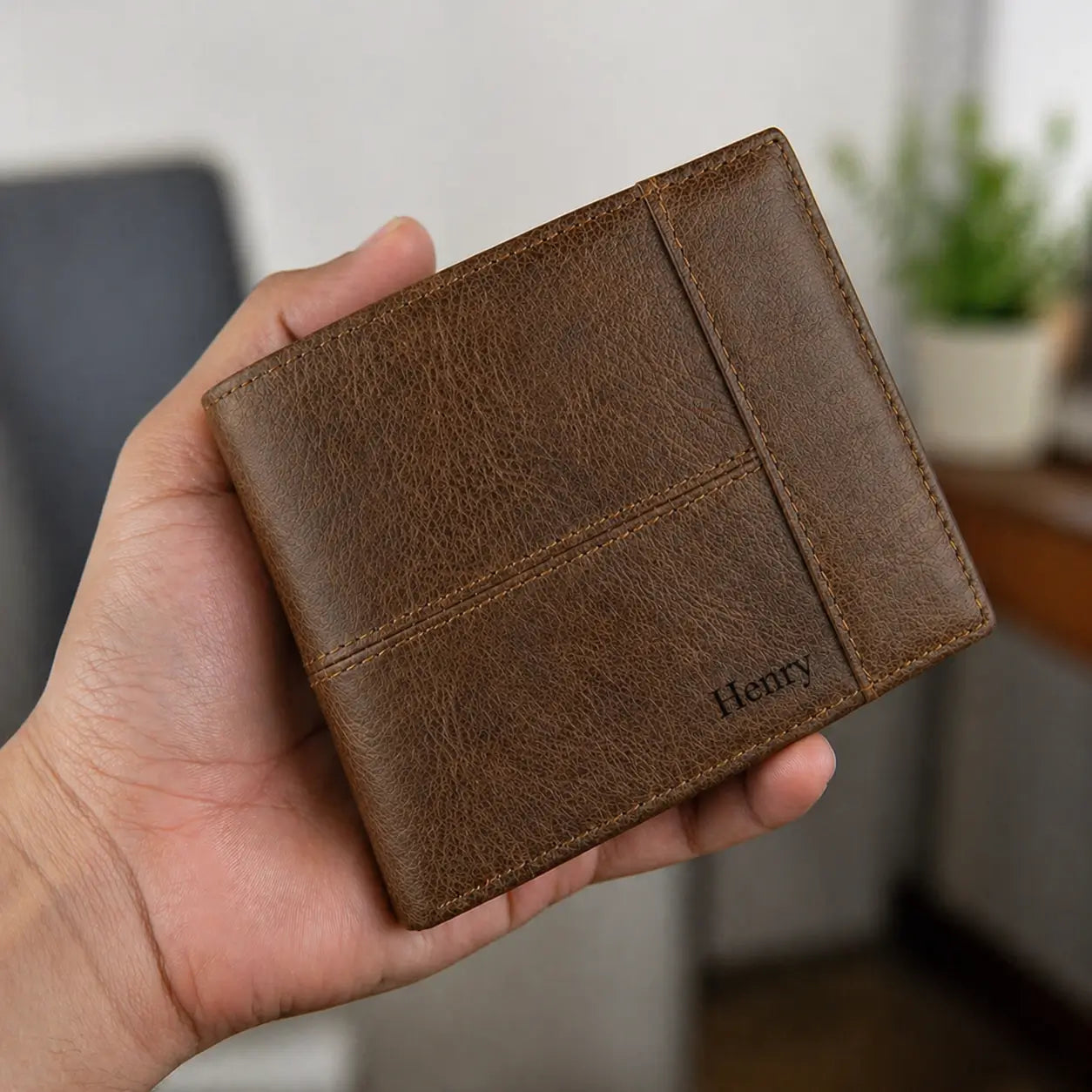 Handcrafted bifold wallet with a smooth leather finish and custom laser-engraved initials, elegantly boxed for a premium unboxing experience.