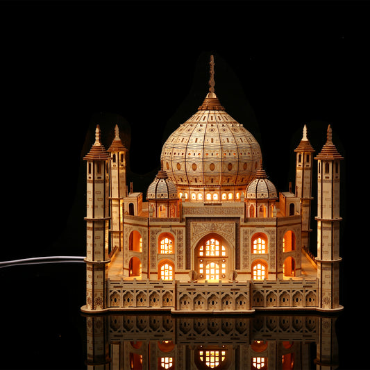 Model of the Taj Mahal with illuminated interior on a black background