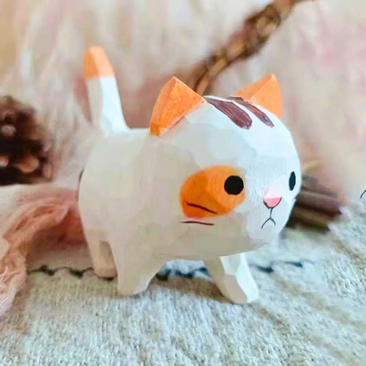 Mini hand carved wooden cat figurine with orange and white markings, hand painted beautifully, elegant for house warming or home decor.