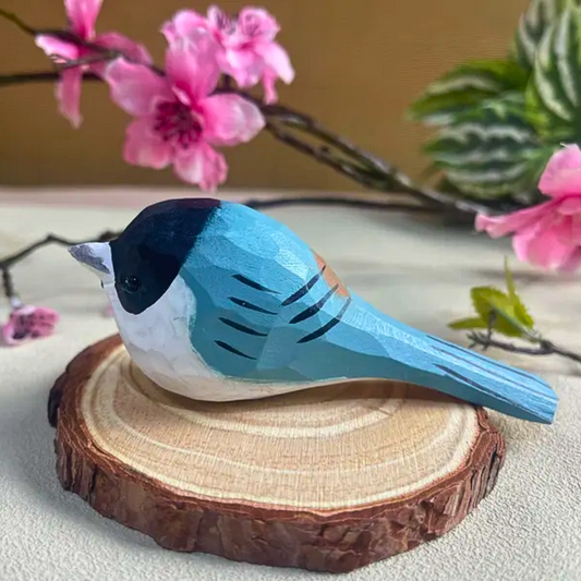 Blue bird figurine on a wooden slice, beautifully hand carved, adds a charm to the home decor.