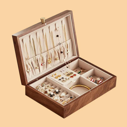 A custom wooden jewelry box with different sections for different pieces, organizes jewelry in an elegant manner.