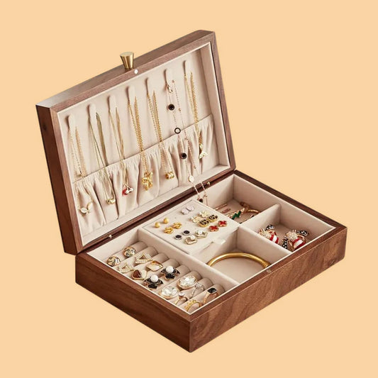 A custom wooden jewelry box with different sections for different pieces, organizes jewelry in an elegant manner.