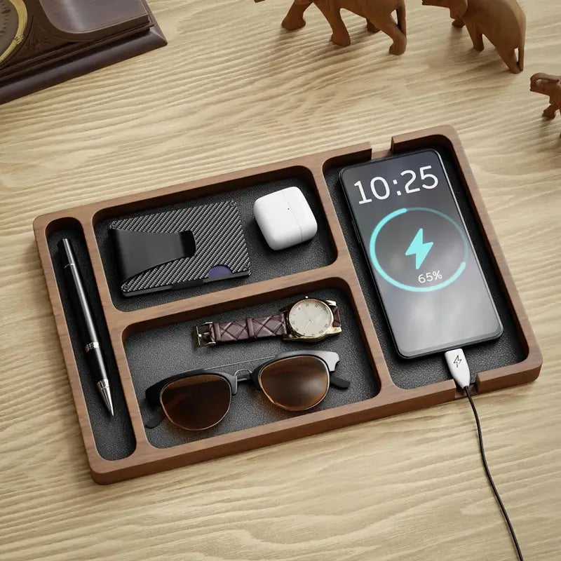  Wooden valet desk tray holding pen wallet airpods watch sunglasses and charging phone on wooden desk