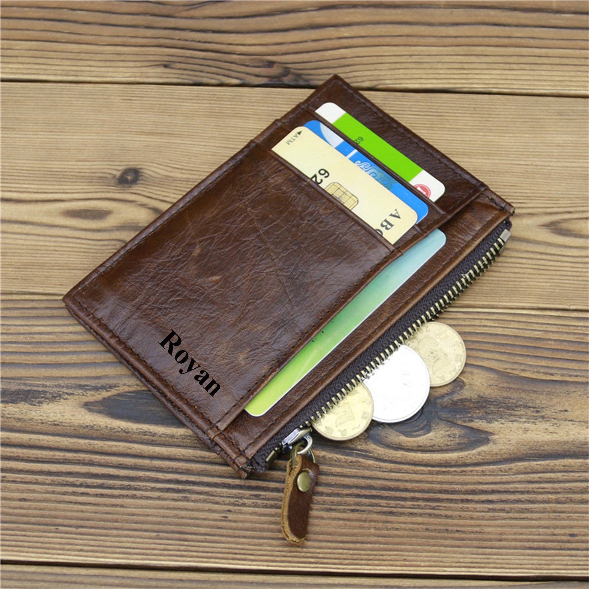 Custom monogrammed men's leather wallet in deep chocolate brown, featuring a personalized laser-etched name and reinforced edge stitching, ideal for professional gifts.