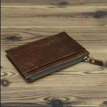 Custom monogrammed men's leather wallet in deep brown, featuring a personalized laser-etched name and reinforced edge stitching, presented in a professional flat-lay.