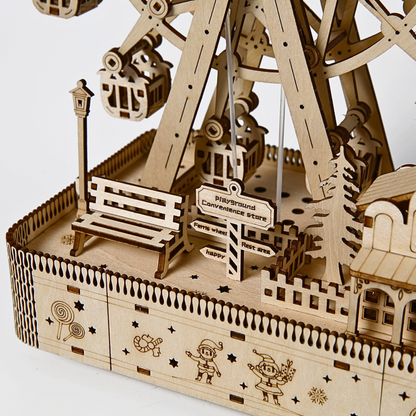 Wooden model of a Ferris wheel with detailed design on a white background