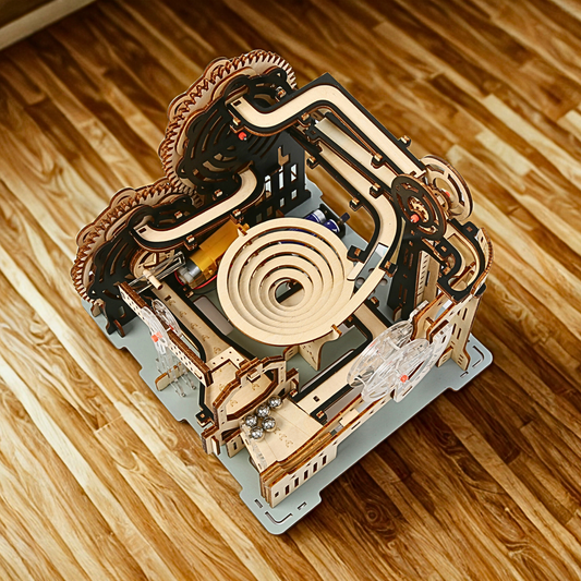 Wooden marble run puzzle model on a wooden surface