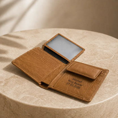 Interior view of a high-quality tan leather trifold wallet highlighting organized card slots, a snap coin compartment, and custom laser engraving for "Mitchell, Ring Bearer."