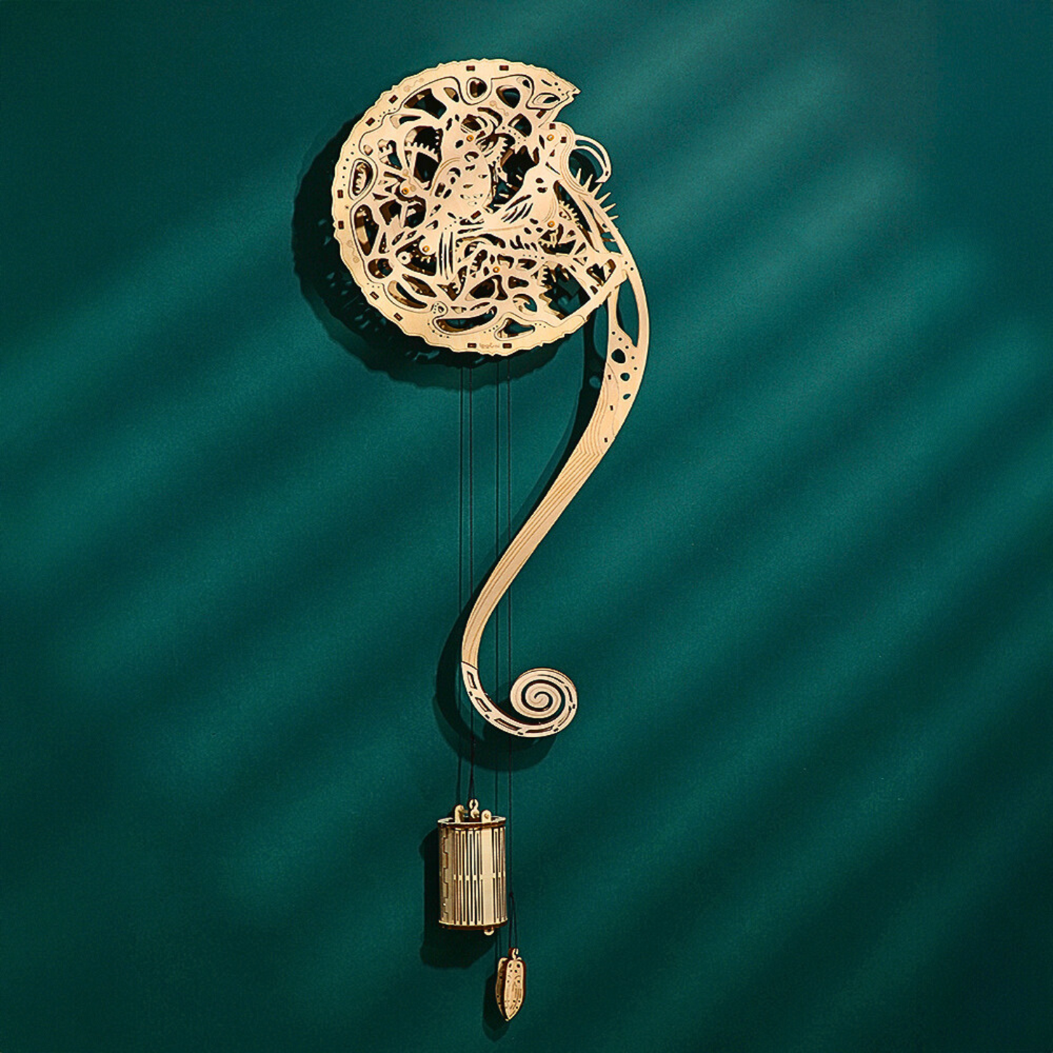 Decorative wall hanging wooden puzzle of a mechanical clock with intricate design on a teal background